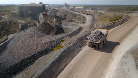A Large Mining Truck Moving Rocks to a Processing Plant