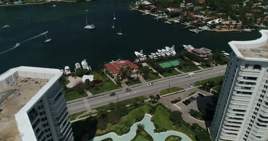 High aerial view over Boca Raton waterfront condominiums, coastal homes, docks, and boats along the Intracoastal Waterway, 2017.
