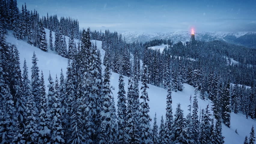 Fire Beacon Burning On Snowy Mountainside