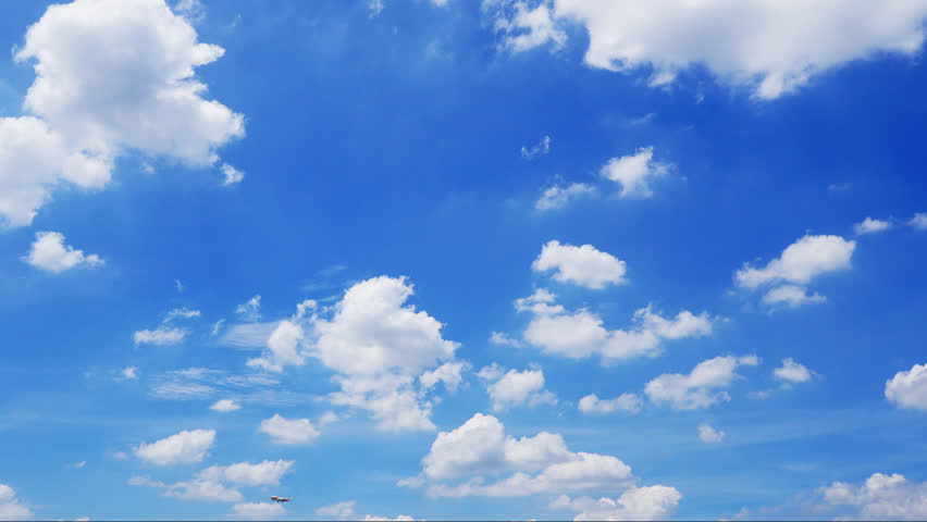 timelapse rolling clouds across blue sky Stock Footage Video (100% ...