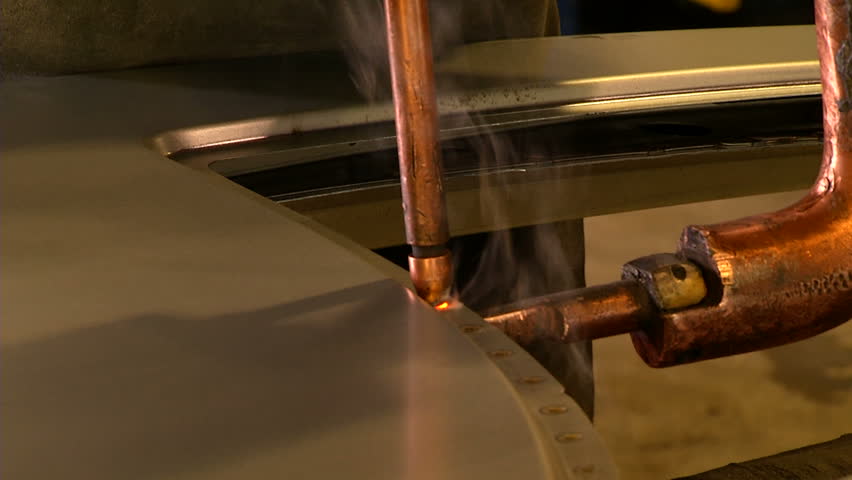 Welding to steel in automotive factory