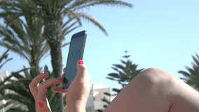 High quality video of woman using mobile phone in 4K