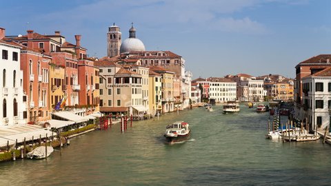 tour boats traveling on Grand Canal near Rialto Bridge, Venice, Veneto, Italy