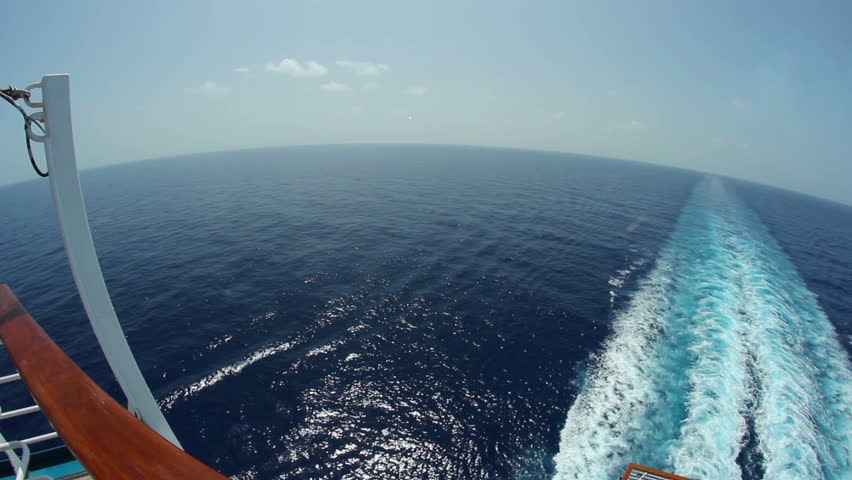 Looking off the back of a large cruise ship.