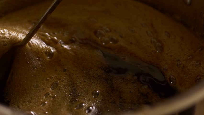 Home Brew Beer making. Boiling of a dark beer liquid in slow motion 4K | Shutterstock HD Video #26115986