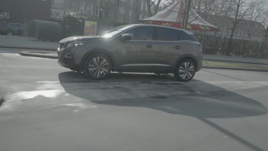 Slow motion shot of beautiful luxury sport SUV car