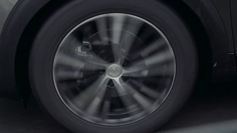 Driving close up luxury SUV sport car rims