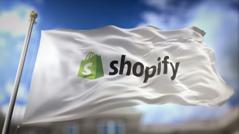 BRISBANE, AUSTRALIA - APRIL 23, 2017 : Shopify Flag Waving Slow Motion 3D Rendering Blue Sky Background - Editorial Animation Seamless Loop 4K