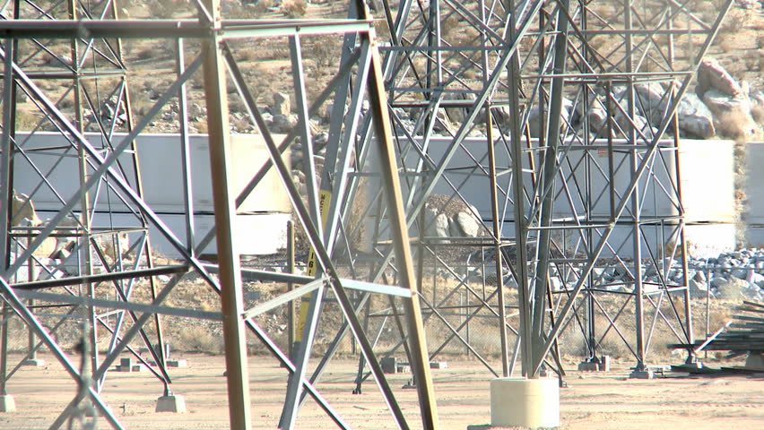 NEVADA, USA, FEB 29, 2012: Train is running through Power Pylons