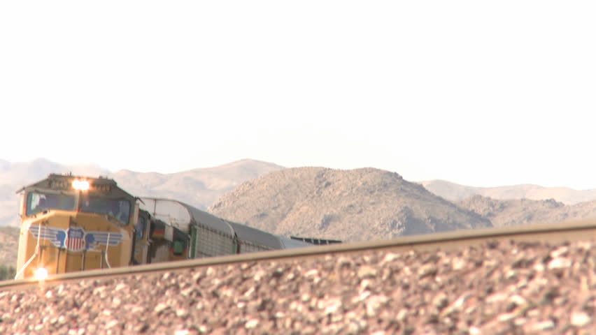 NEVADA, USA, FEB 29, 2012: Cargo train passing on railroad tracks through the