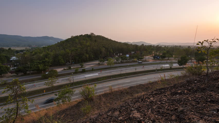 A time-lapse cars on the roads at sunset