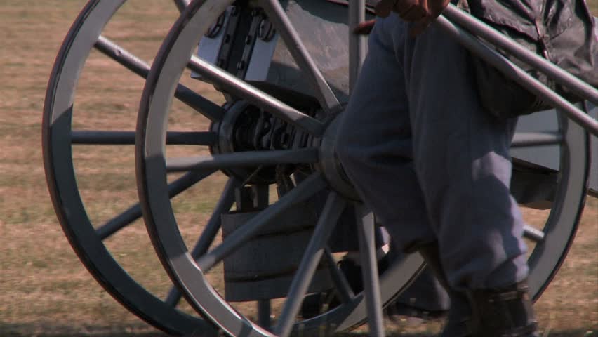 NEWPORT, RHODE ISLAND - CIRCA SEPTEMBER 2007: Civil War reenactment soldiers rolling a canon forward