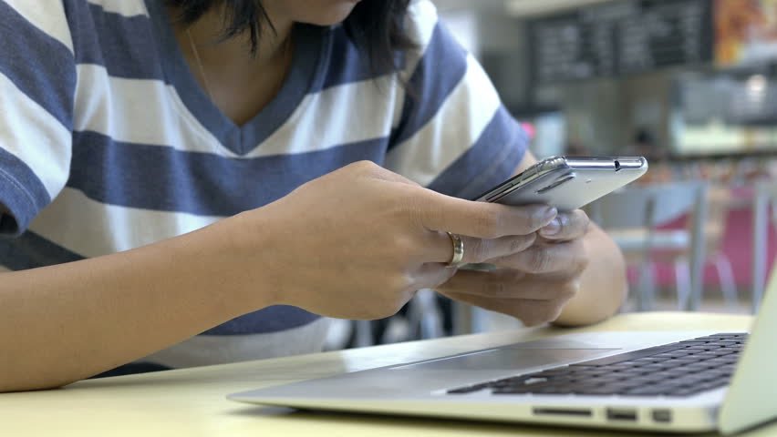 woman hand using smartphone