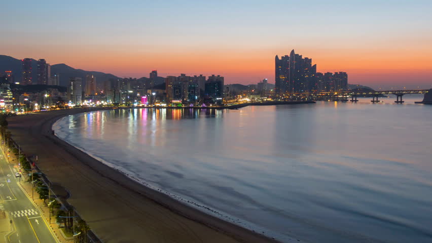 Sunrise view of Busan, South Korea.  Gwangan bridge and city center. Time lapse