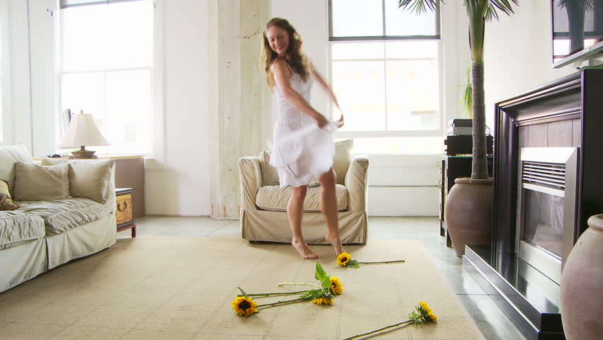 Woman dancing with sunflowers | Shutterstock HD Video #2615768