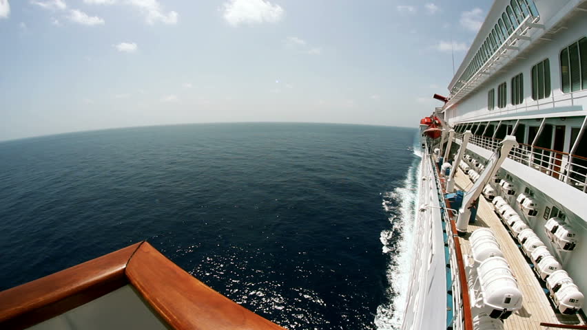 Looking off the side of a large cruise ship.  