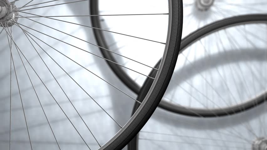 Close-up bicycle wheel spinning.