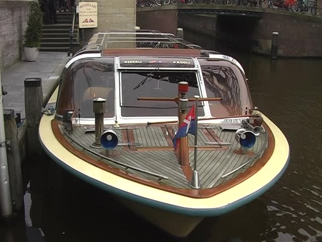 Cruise-boat lying in the middle of Amsterdam Holland