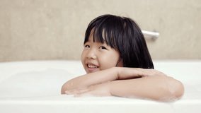video of cute girl take bath smile happily in bathroom