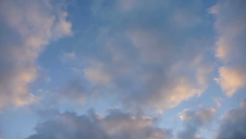 Early clouds with sunrise with blue sky time lapse.