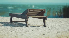 Wooden lounger on the beach - Powered by Shutterstock - Get 15% off with code: PIKWIZARD15