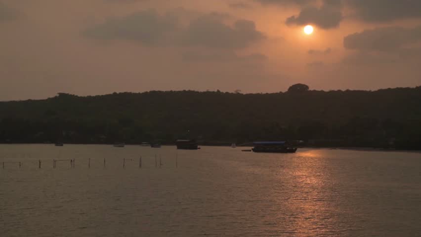 Beautiful sunset river wit house-boats