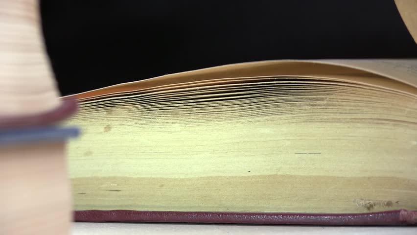 The Leaves Of An Old Big Book Are Turned, Then The Book Is Closed
