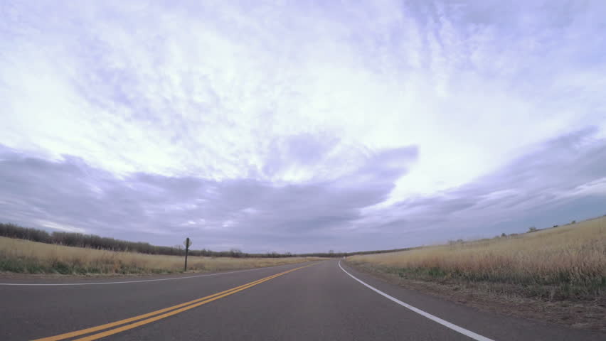 POV point of view - Driving through Cherry Creek State Park early in the morning.