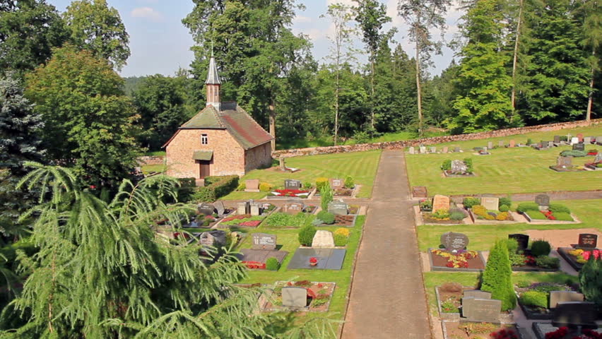 Camera pan over an old historic cemetery in Europe