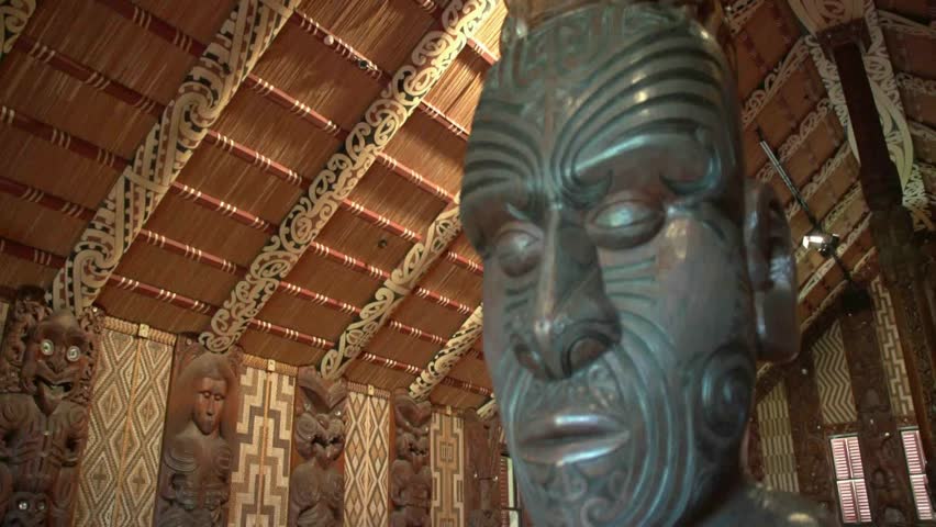 PAIHIA, NEW ZEALAND - CIRCA JULY 2012: Maori carvings in the Marae meeting house