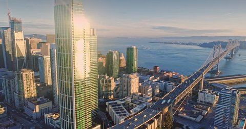 Aerial drone of the san francisco city skyline and bay bridge at, sunrise, sunset