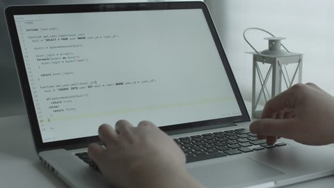 Stylish time-lapse web coding  on a laptop - 4K Flat Log ProRes