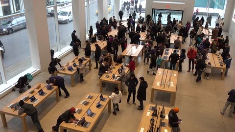 New York City,USA - March 18, 2017: Interior view to the Apple Store. This is one of the most profitable Apple shops worldwide, located at the Fifth Avenue in Manhattan.