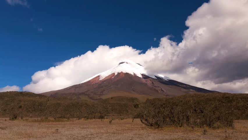 Fast moving clouds over the Cotopaxi volcano in Ecuador 5897 m 19347 ft, the