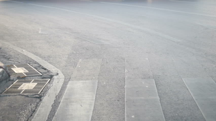People walking across the street