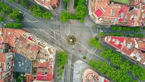 Roundabout in Barcelona, Spain, top view. 4K aerial rotating video