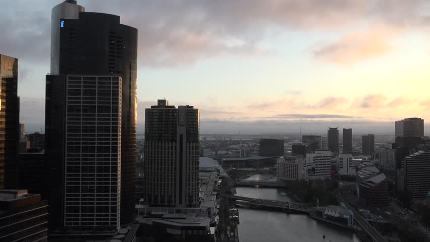 Melbourne City Aerial View over River - Sunset, city buildings, Australia