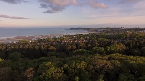 Aerial view from Clyne Park of low tide at the Mumbles and West Cross area of Swansea, South Wales, UK