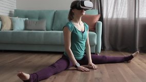 Girl in Virtual Reality Glasses is Engaged in Sports, Twine at Home
