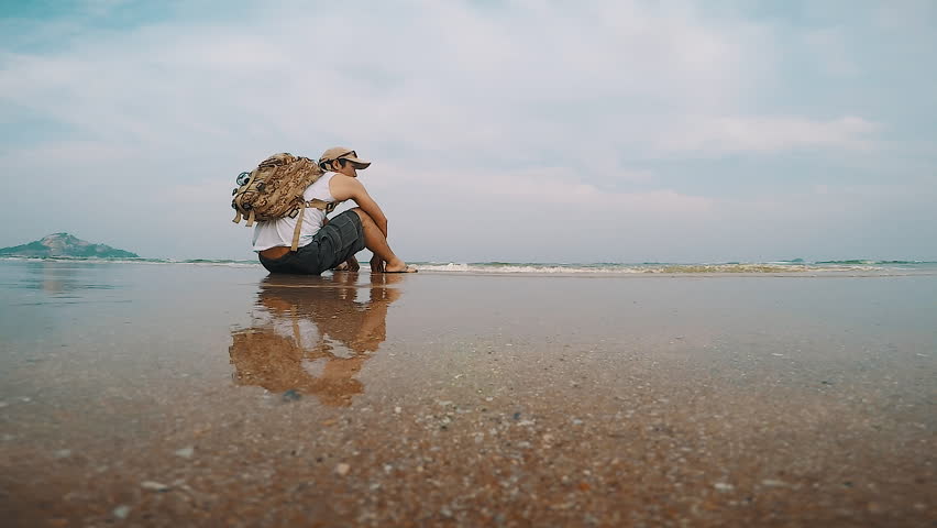 Man sitting on the beach
