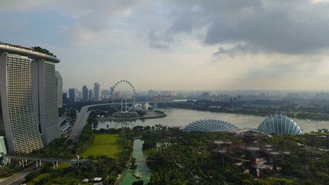 4k erial fly-over view of Gardens By The Bay, Singapore. Featuring Supertree Grove, Cloud Forest and Flower Dome