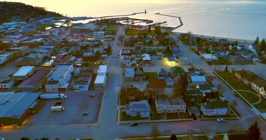 Scenic Algoma Wisconsin before Sunrise, harbor and Lighthouse in vast Lake Michigan, aerial view.