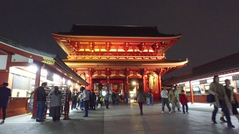 TOKYO, JAPAN - CIRCA MARCH, 2017: POV Walking in Senso Ji Temple at night. The Senso-ji Temple is the symbol of Asakusa and one of the most famous temples in Japan. 