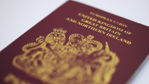 UK Passport HD Footage against a white background with a sliding camera move 