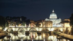 Video Timelapse of the Saint Peter Basilica and a bridge at night in Rome. 