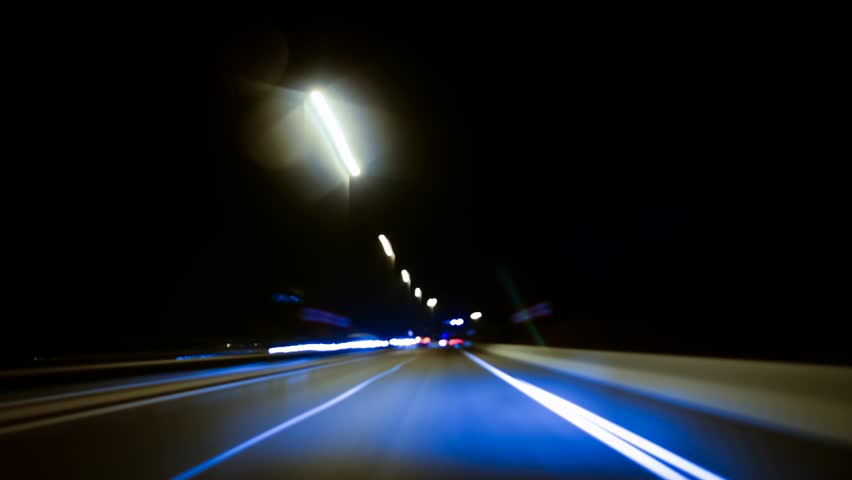 Freeway night driving. Time lapse.