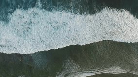 Top View of the Giant Waves, Foaming and Splashing in the Ocean, Sunny Day, Slow Motion Video, Indonesia, Bali