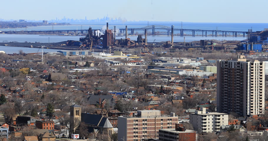 4K UltraHD Burlington skyway from the Niagara escarpment with Toronto skyline in background