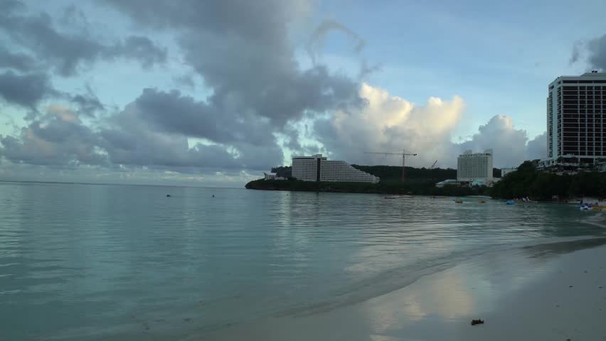 Guam, Japan - March 20, 2017: Sunset on the beach in Guam, Japan