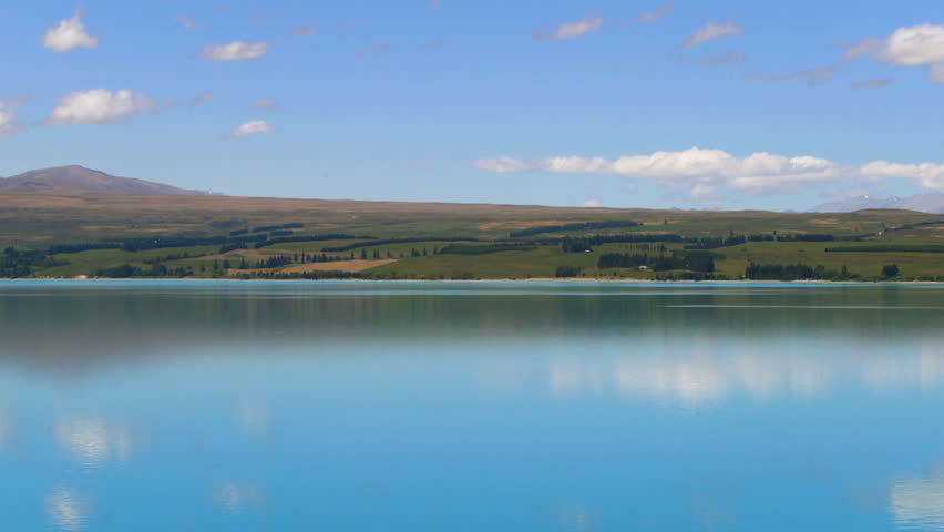 Lake landscape, clouds reflection on water at Lake Pukaki, Mt Cook National Park, New Zealand